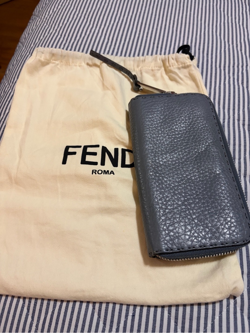 Fendi Gray Selleria Leather Zipper wallet.